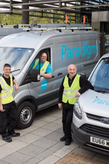 Paradigm technicians with repairs vans