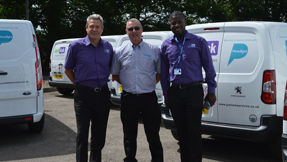 Just Ask Team and Derek Currie, Estates Manager standing by vans