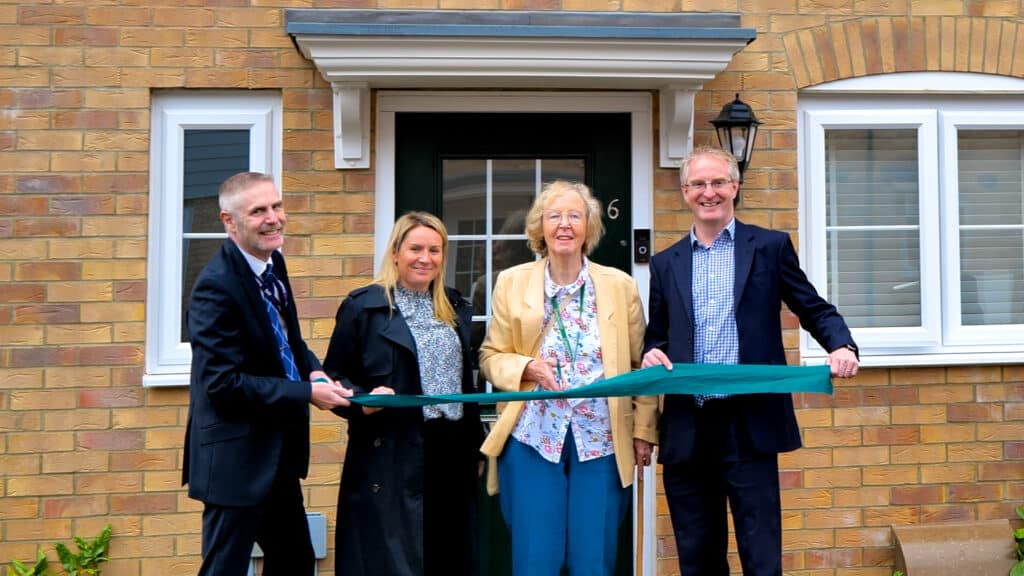 Picture of ribbon cutting including Jonathan Geal and Mione Goldspink from East Herts Council, Verity MacMahon from Vistry, and Martyn Jones from Paradigm.
